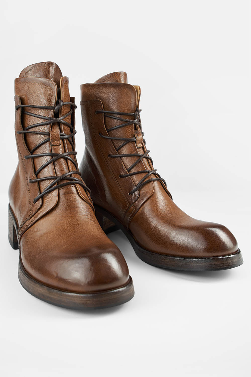 EXETER caramel-brown lace up boots.