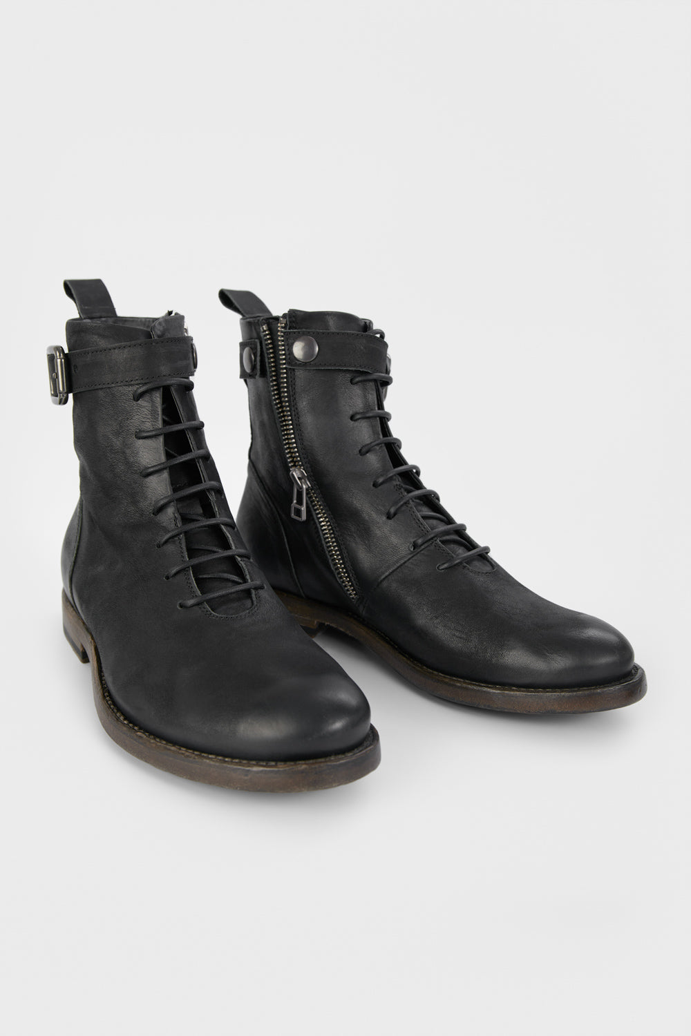 SLOANE matte-black lace-up buckle boots.