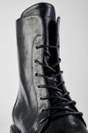 AVERY jet-black lace-up boots.