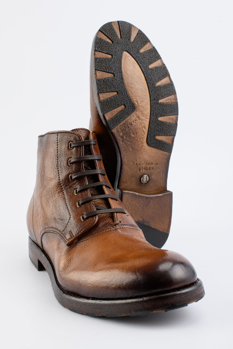 ASTON dry-terra asymmetric ankle boots.