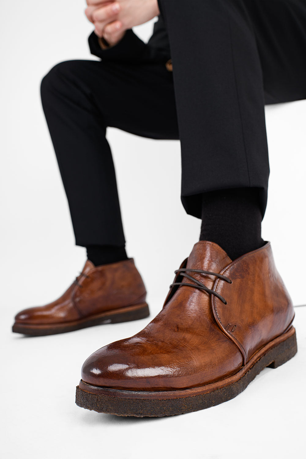 BROMPTON rich-brown chukka boots.