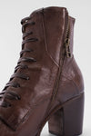 ASTON chocolate-brown lace-up boots.