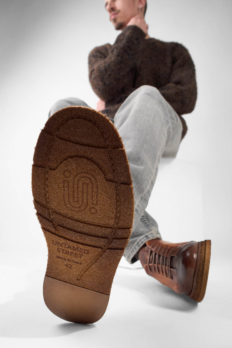 AJAX cognac distressed lightweight sneakers.