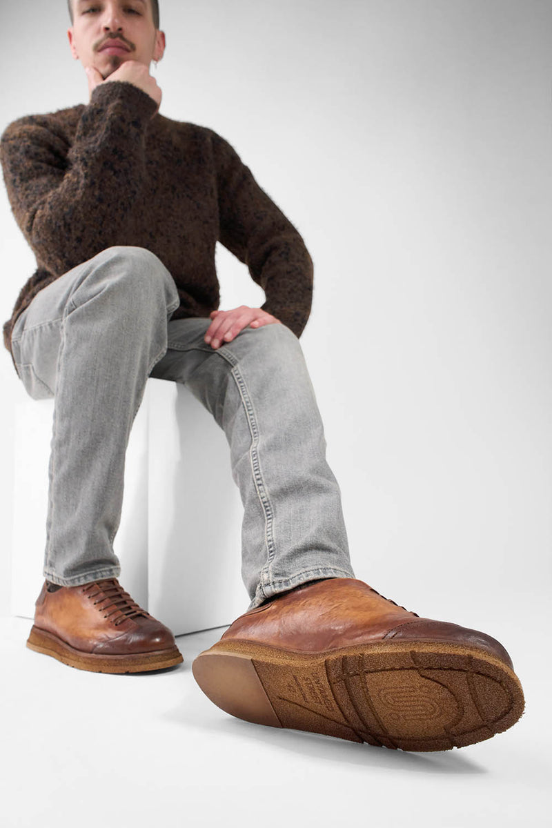 AJAX cognac distressed lightweight sneakers.