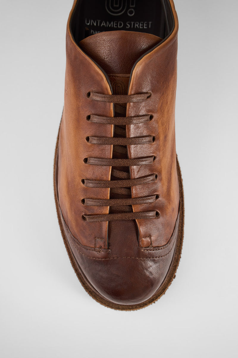 AJAX cognac distressed lightweight sneakers.