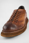 AJAX cognac distressed lightweight sneakers.