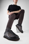 AJAX steel-grey distressed lightweight sneakers.