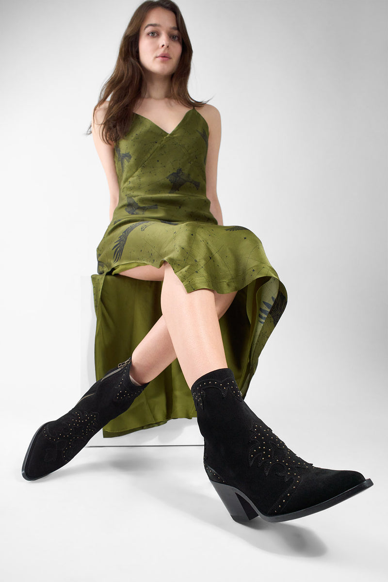 AUSTIN black suede studded texan boots.