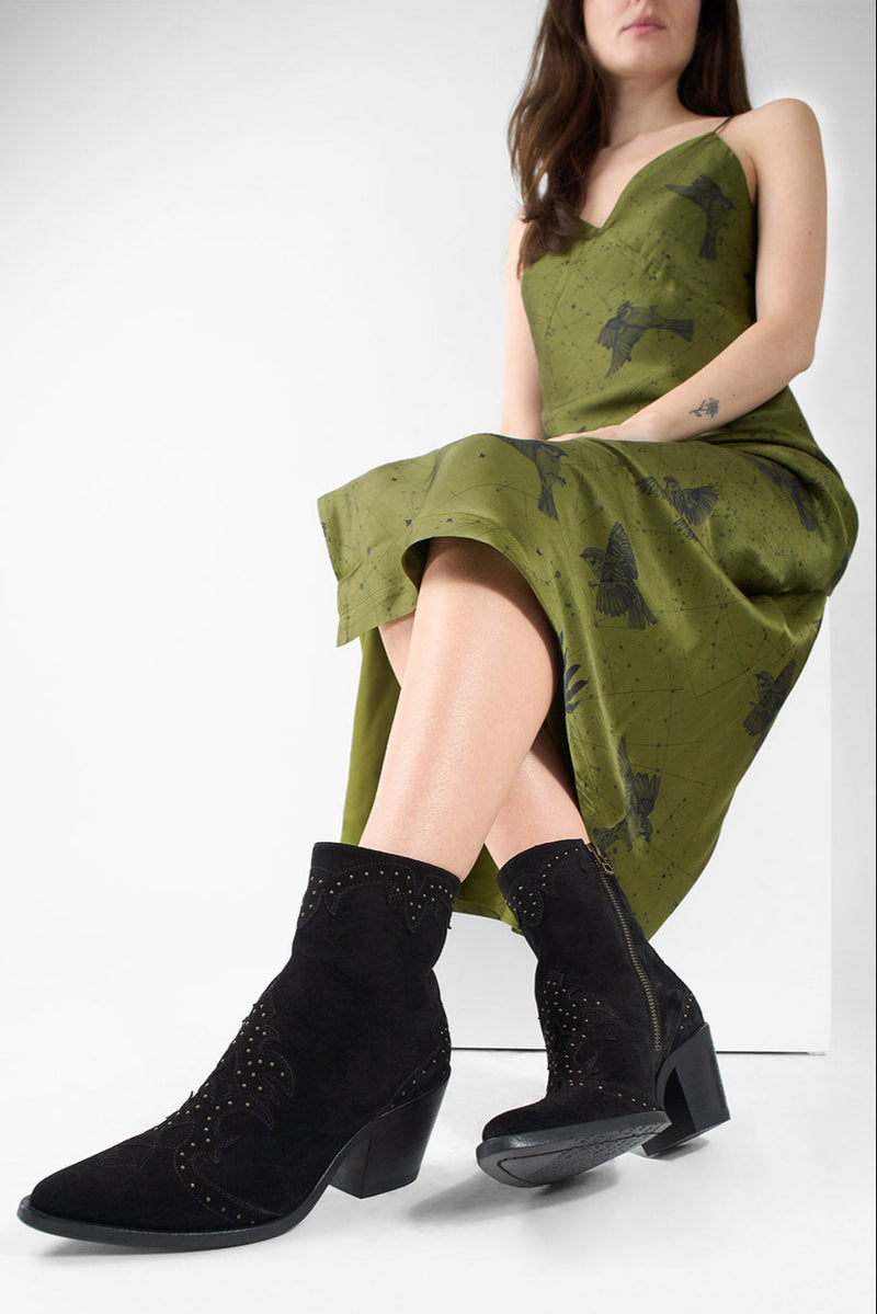 AUSTIN black suede studded texan boots.
