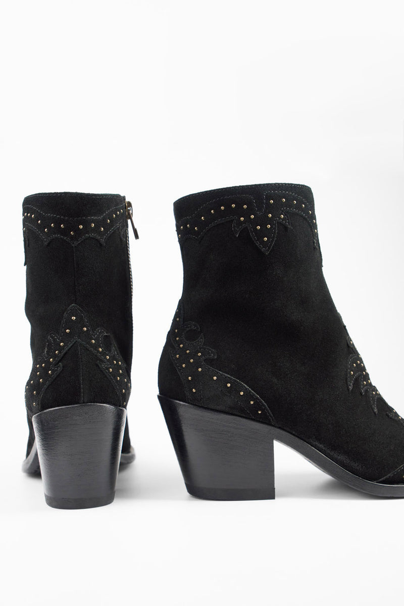 AUSTIN black suede studded texan boots.