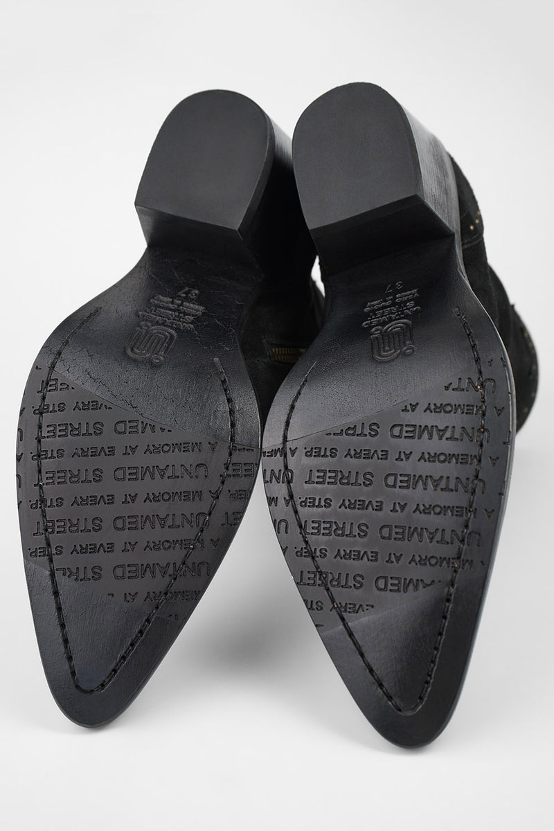 AUSTIN black suede studded texan boots.