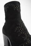 AUSTIN black suede studded texan boots.