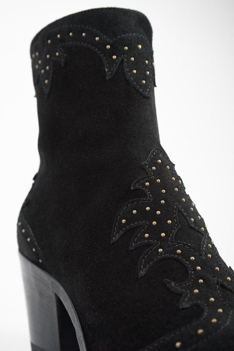AUSTIN black suede studded texan boots.