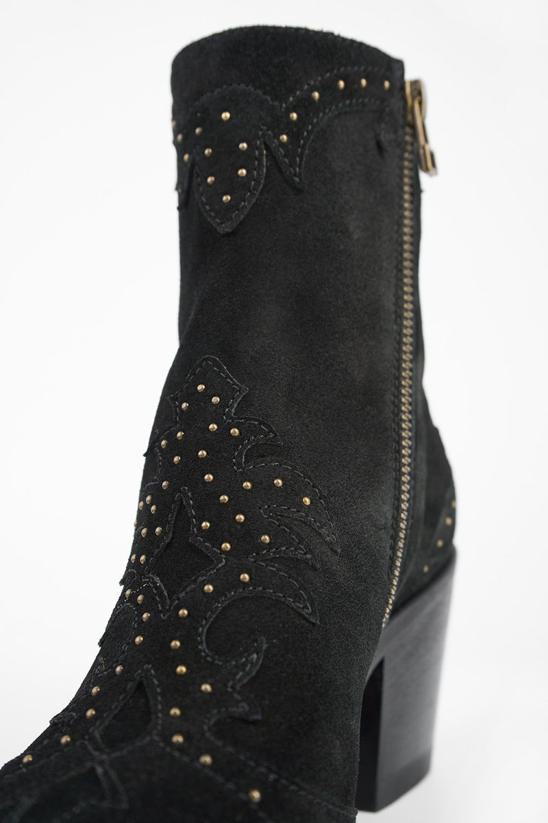 AUSTIN black suede studded texan boots.