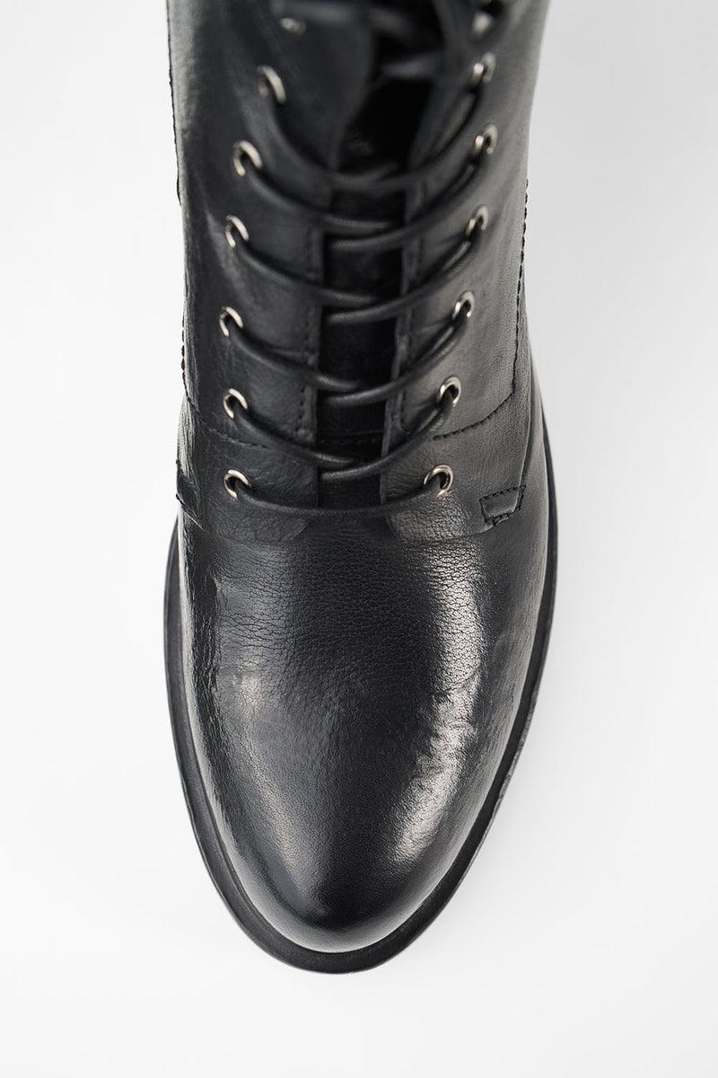 AVERY jet-black grunge military boots.