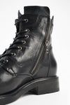 AVERY jet-black grunge military boots.