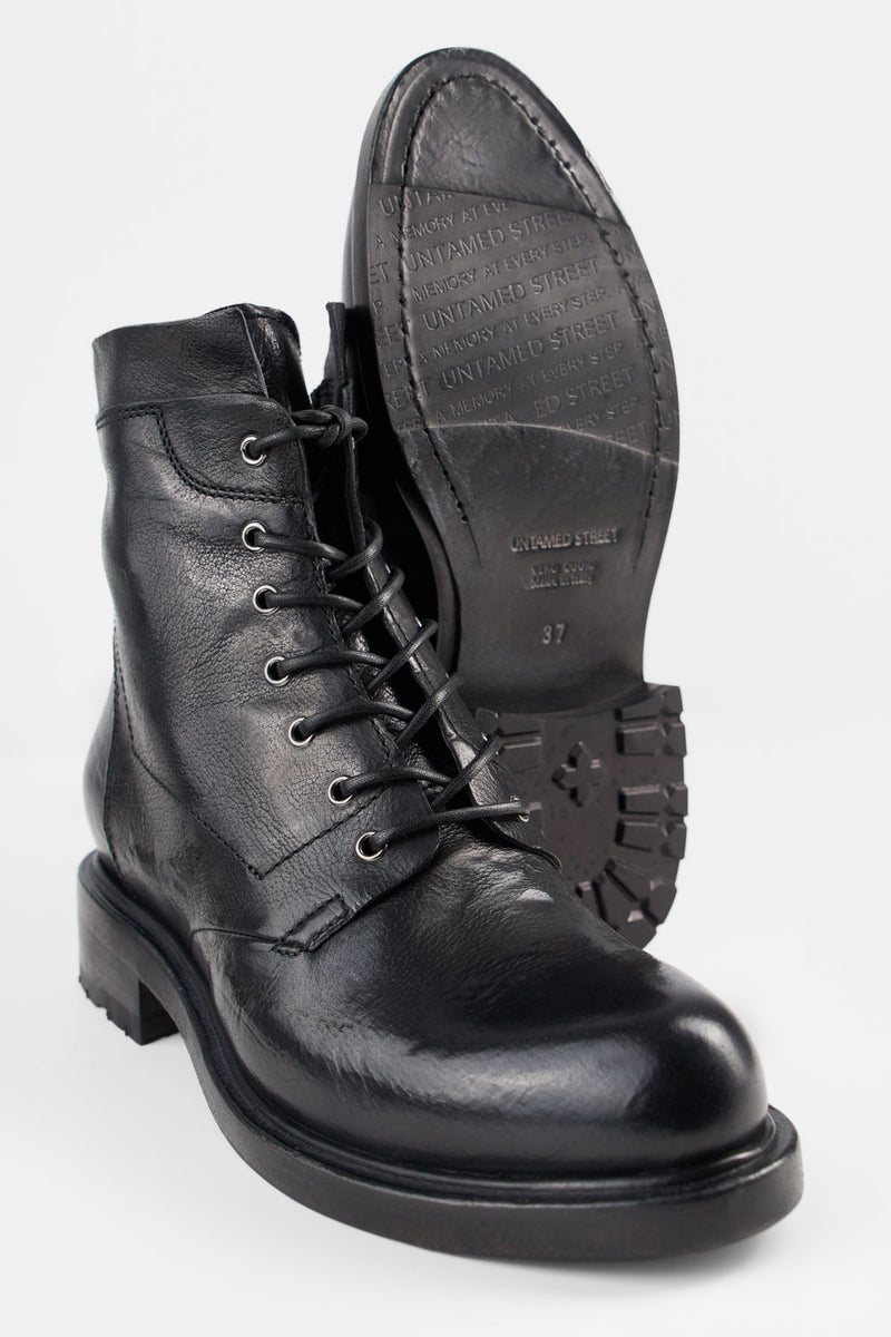 AVERY jet-black grunge military boots.