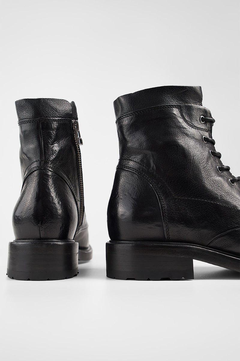AVERY jet-black grunge military boots.
