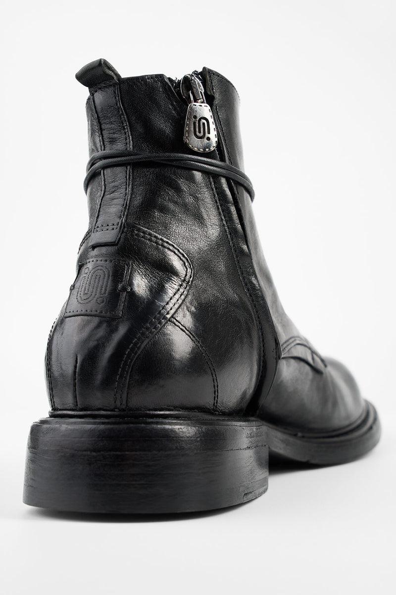 BOLTON limo-black layered lace up boots.