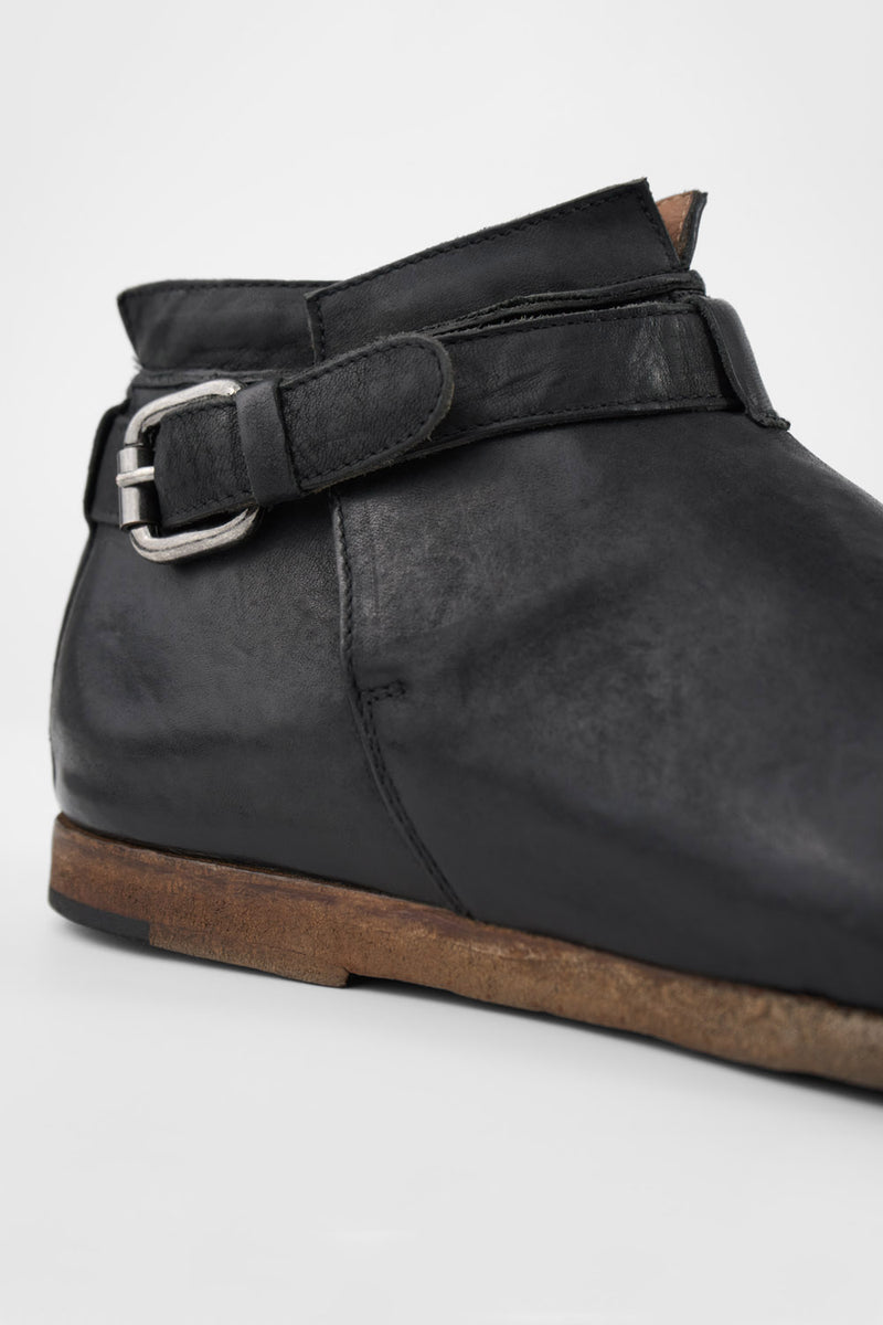 BRUCE rugged-black buckle ankle boots.