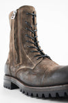 CAMDEN dark-moss suede double-zip military boots.