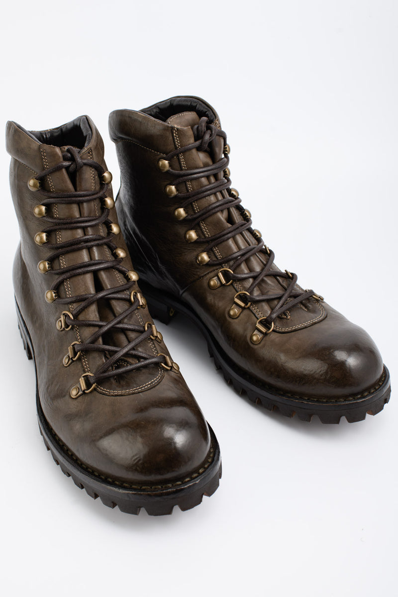 CAMDEN bronze combat boots.