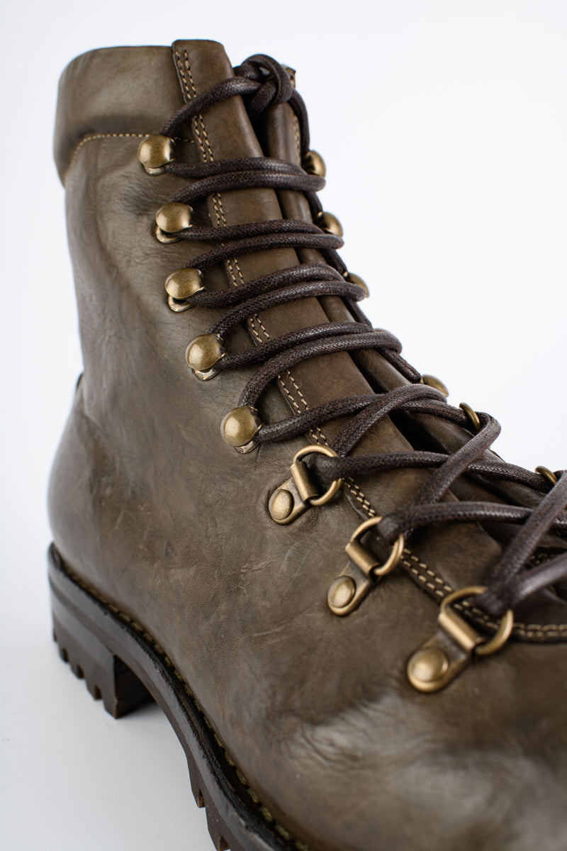 CAMDEN bronze combat boots.