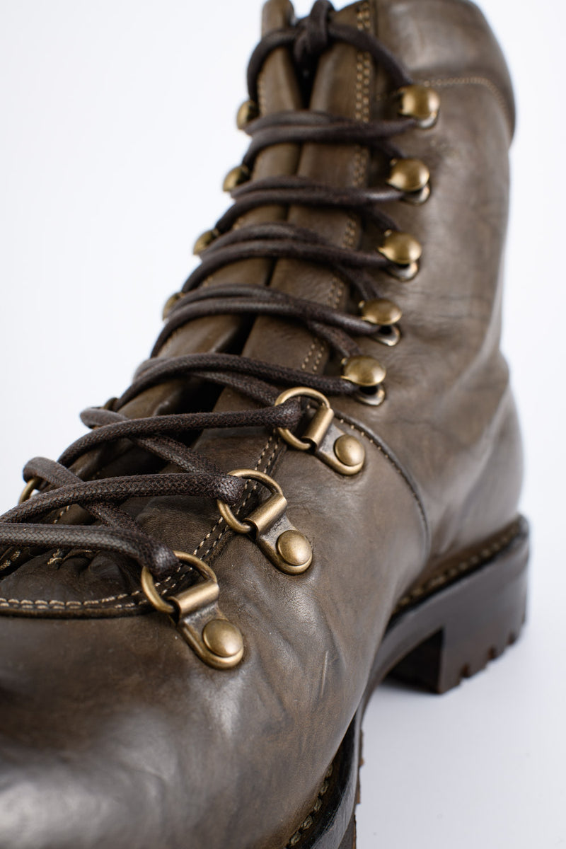 CAMDEN bronze combat boots.