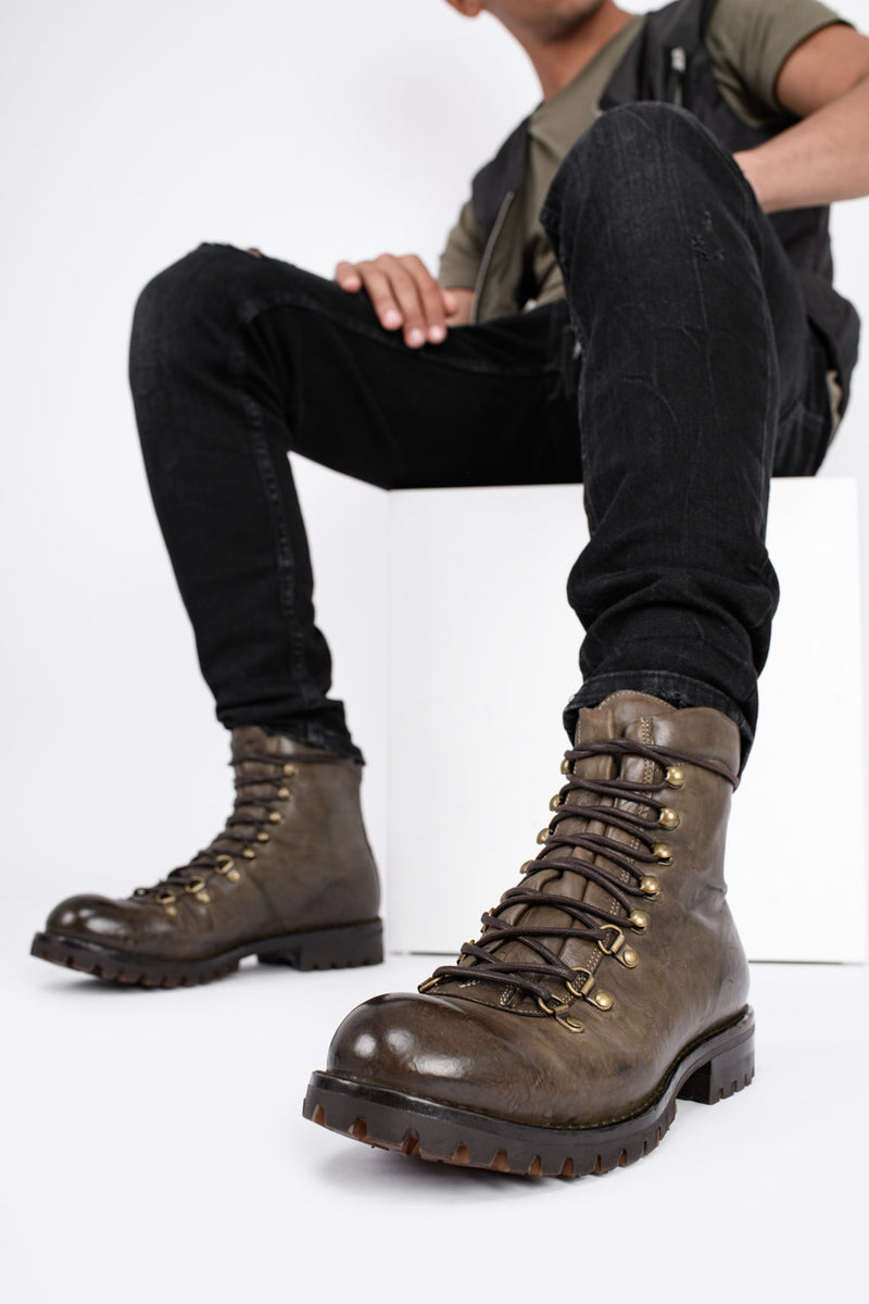 CAMDEN bronze combat boots.