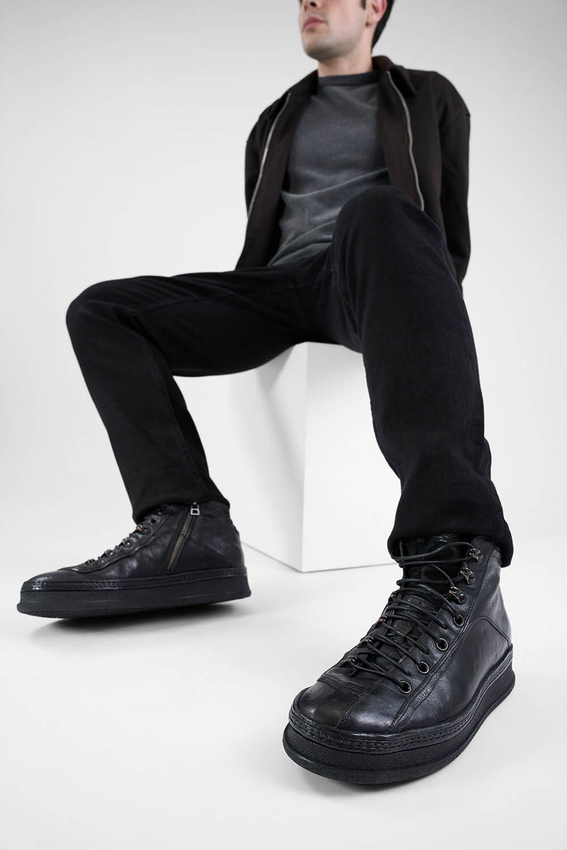COLE urban-black asymetric welted high sneakers.