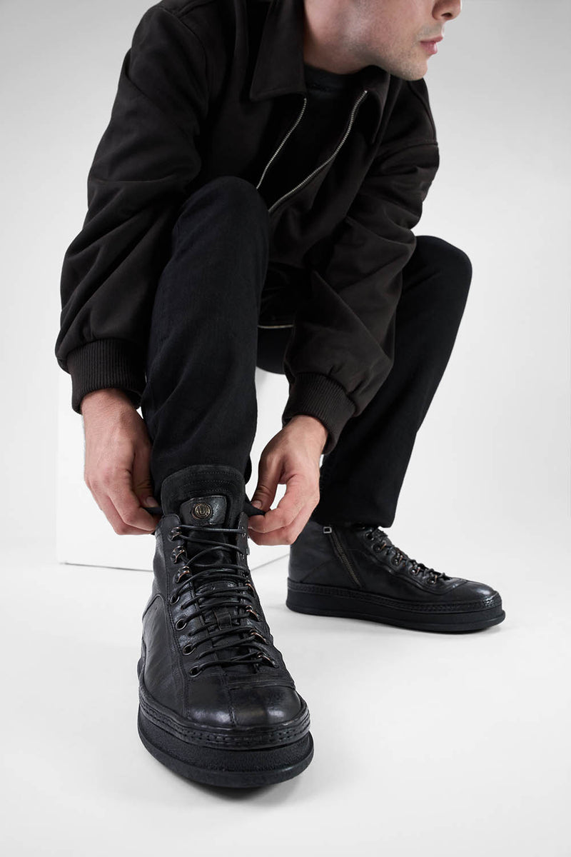 COLE urban-black asymetric welted high sneakers.