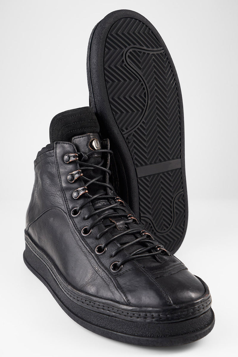 COLE urban-black asymetric welted high sneakers.