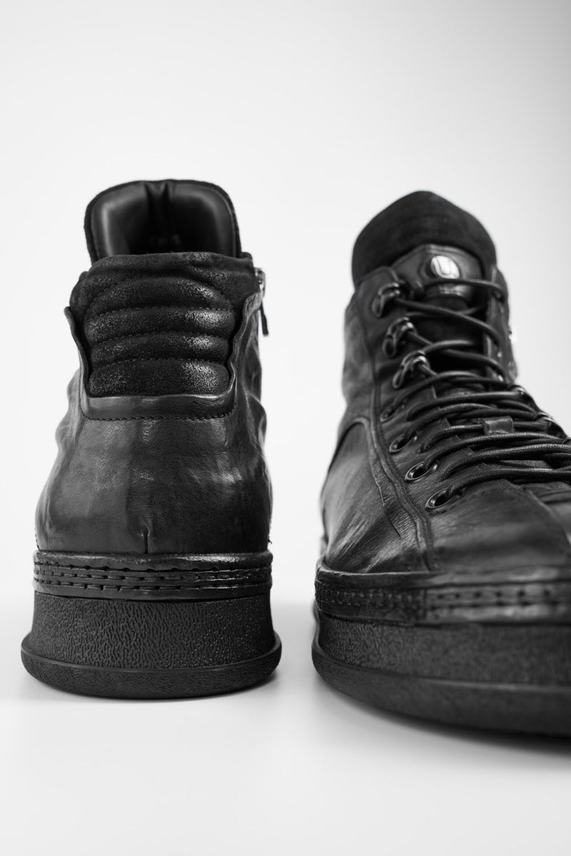 COLE urban-black asymetric welted high sneakers.