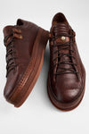 COLE cognac welted distressed loop sneakers.