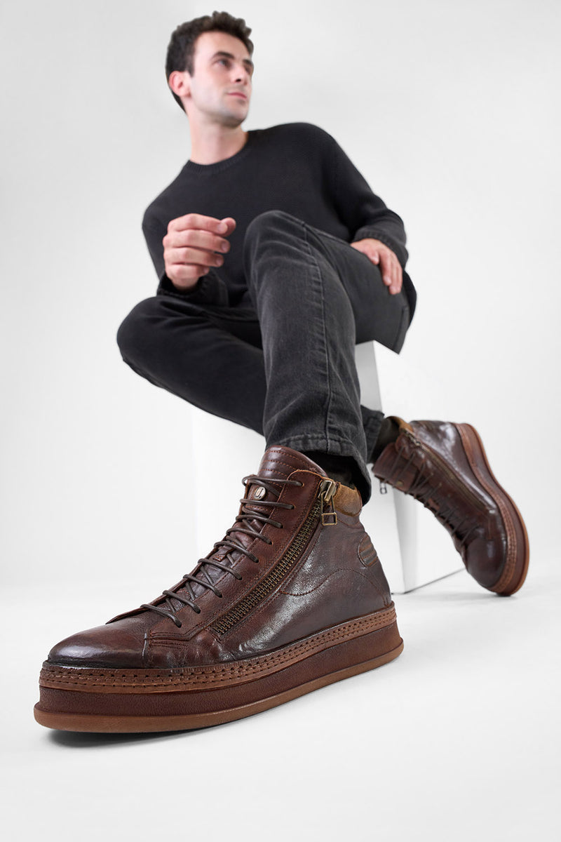 COLE cognac welted double-zip high sneakers.