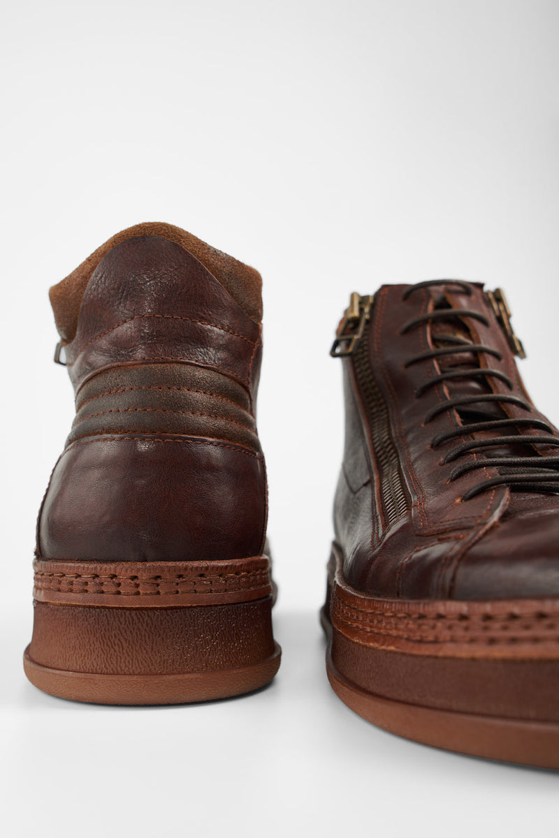 COLE cognac welted double-zip high sneakers.