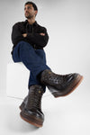 COLE dark-cocoa welted distressed high sneakers.