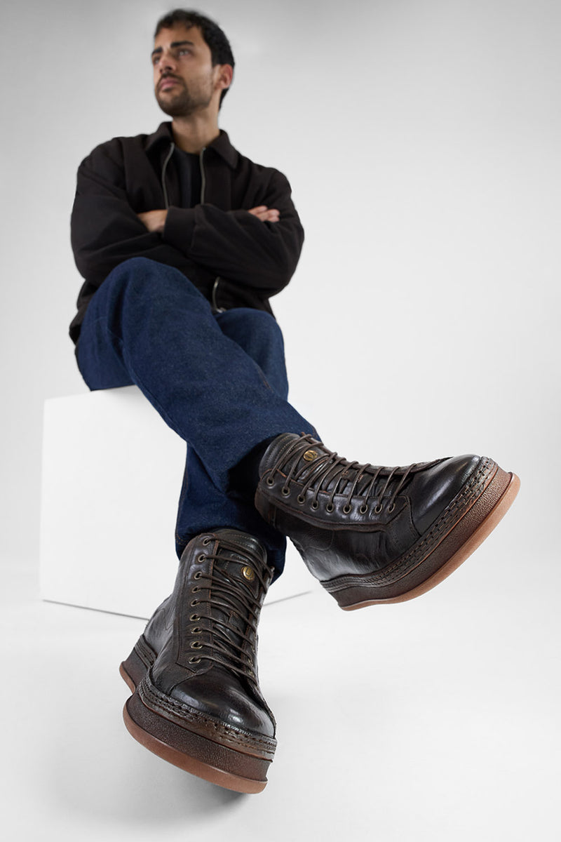 COLE dark-cocoa welted distressed high sneakers.
