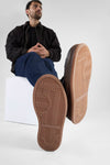 COLE dark-cocoa welted distressed high sneakers.