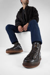 COLE dark-cocoa welted distressed high sneakers.