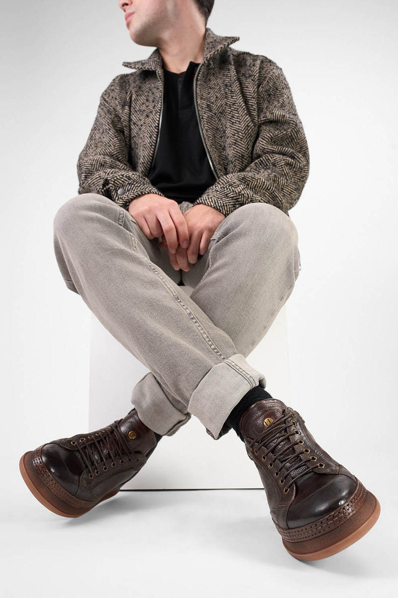 COLE dark-cocoa welted distressed sneakers.