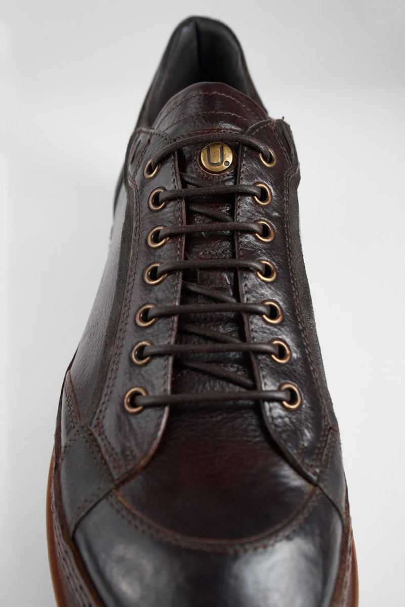 COLE dark-cocoa welted distressed sneakers.