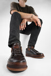 COLE dark-cocoa welted distressed loop sneakers.