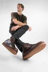 COLE dark-cocoa welted distressed loop sneakers.