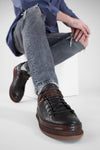 COLE dark-cocoa welted distressed sneakers.