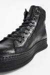 COLE rugged-black welted distressed high sneakers.