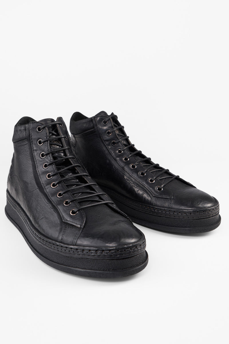 COLE rugged-black welted distressed high sneakers.