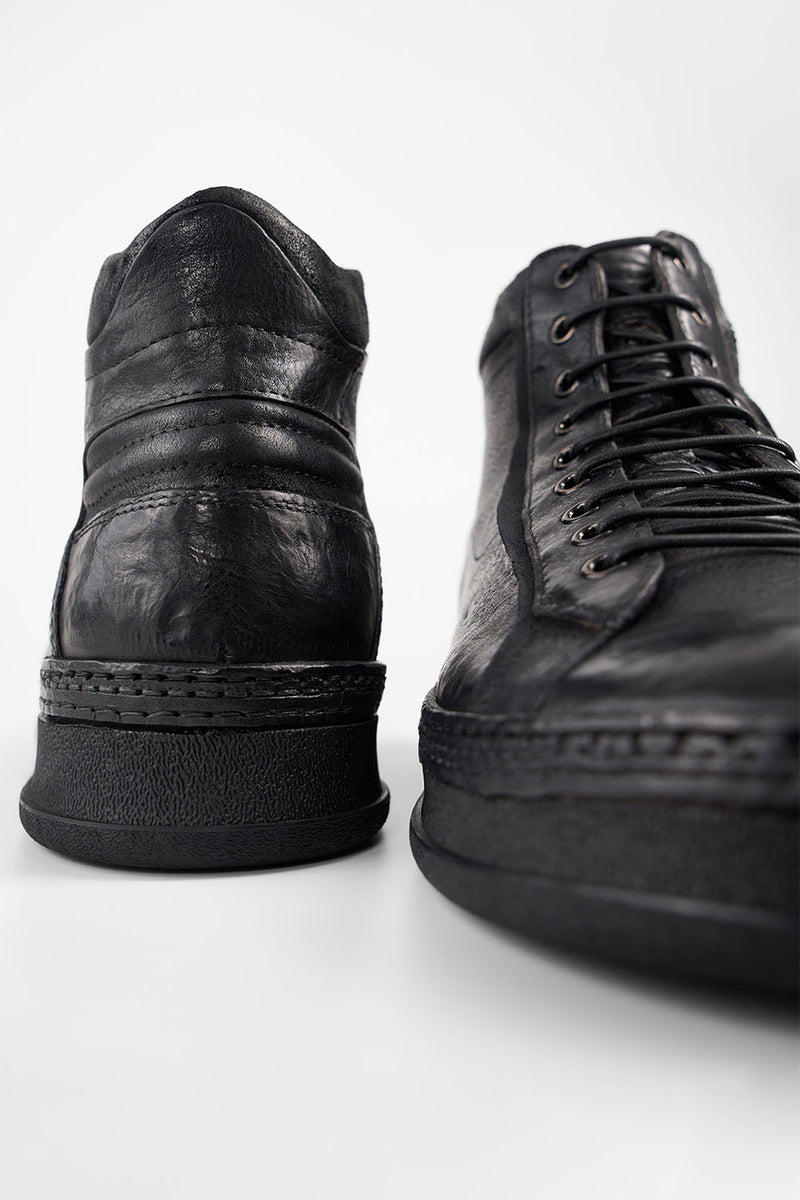 COLE rugged-black welted distressed high sneakers.