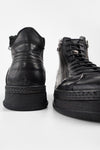 COLE rugged-black double-zip welted high sneakers.