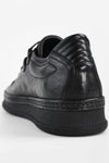 COLE rugged-black welted distressed sneakers.